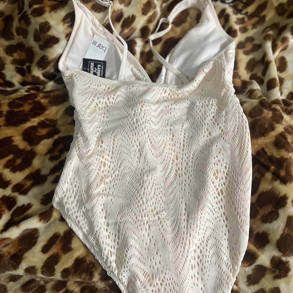 Never worn. Bought wrong size, return a not allowed. Gorgeous color and lace!